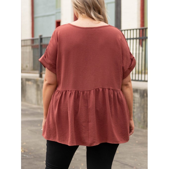V-neck short sleeved shirt with ruffle hem
